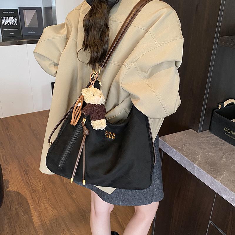 Lässige Pendler-Tragetasche Damen große Kapazität 2025 neue Schulter-Umhängetasche Retro-Mode leichter Rucksack