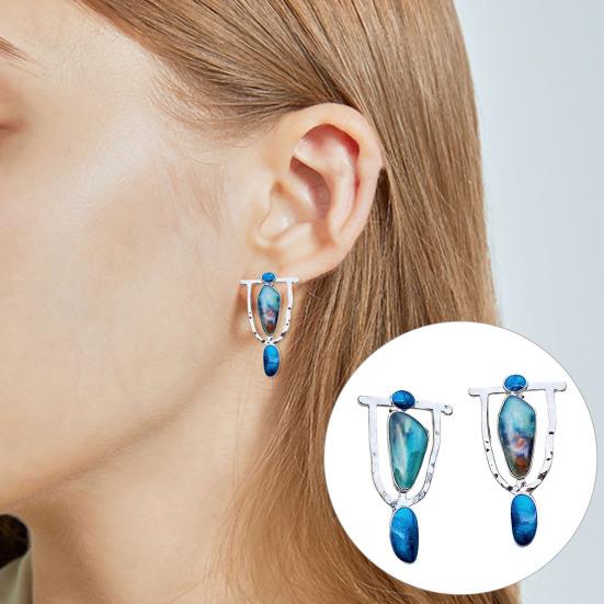 

1 пара длинных полых серег-гвоздиков с мраморным узором, большой размер с преувеличенным камнем неправильной формы