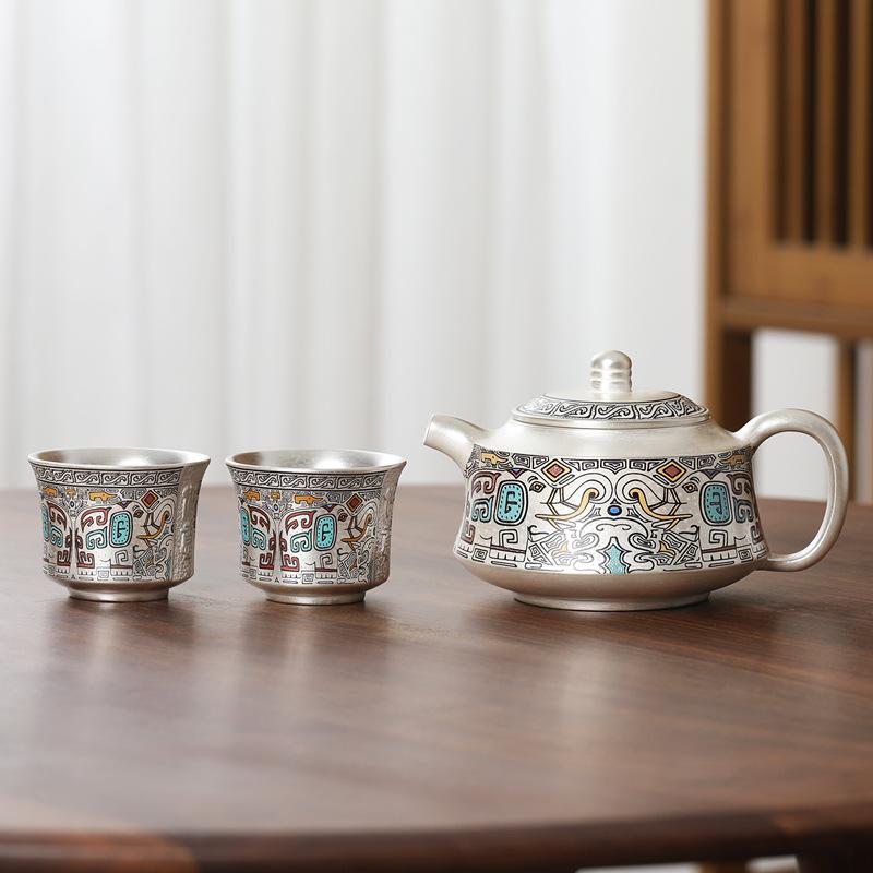 

999 sterling silver, a pot of two cups of ceramic gold and silver wrong pattern Japanese office portable travel kung fu tea set