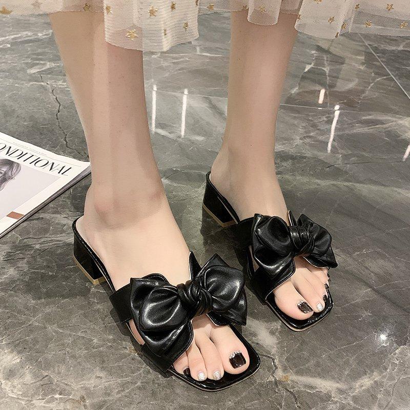 

Sandals new women s fashion trend medium heel thick heel half drag bow one word drag outer wear square head 34 чорний