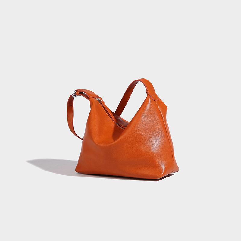 

2024 summer high-end fashion simple underarm commuter messenger dumplings casual large-capacity women s bags помаранчевий