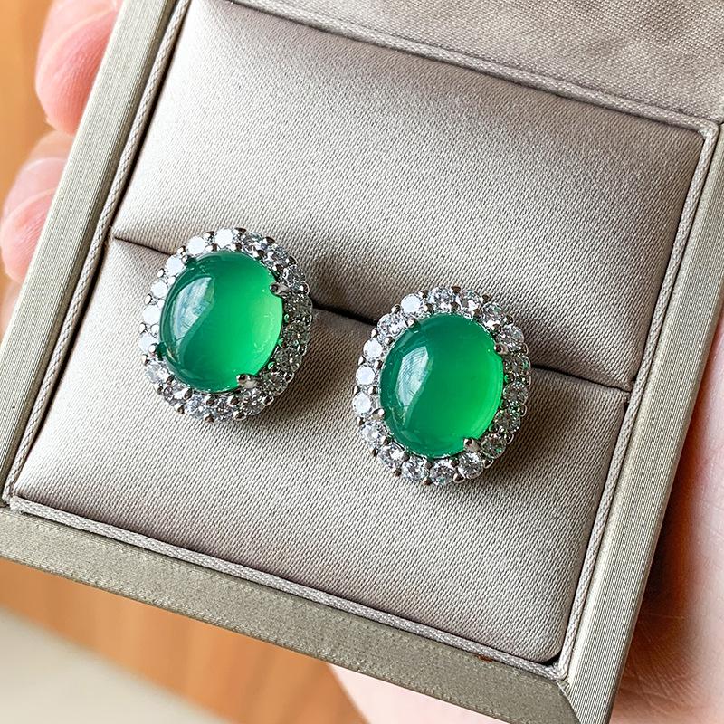 

Ювелирные изделия Медное дно Позолоченное Ледяное зерно Флуоресцентная форма Денье Женское обнаженное тело Темперамент Халцедон Набор 15 * 20