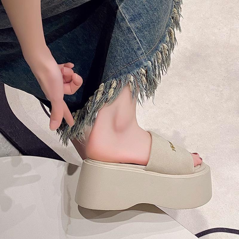 Wedge heel muffin thick-soled one-word cool slippers women's new soft-soled casual outer wear light beach shoes in summer 2025
