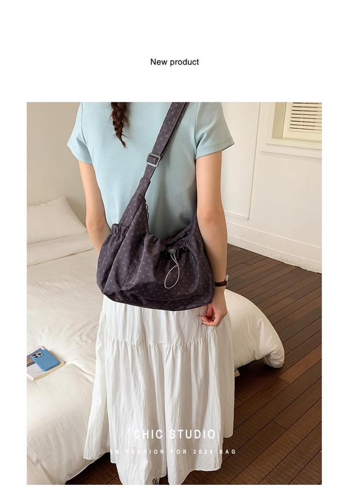 Korean Style Artistic Polka Dot Drawstring Pleated One-Shoulder Crossbody Bag for Women - Large Capacity, Portable, and Perfect for Commutes.