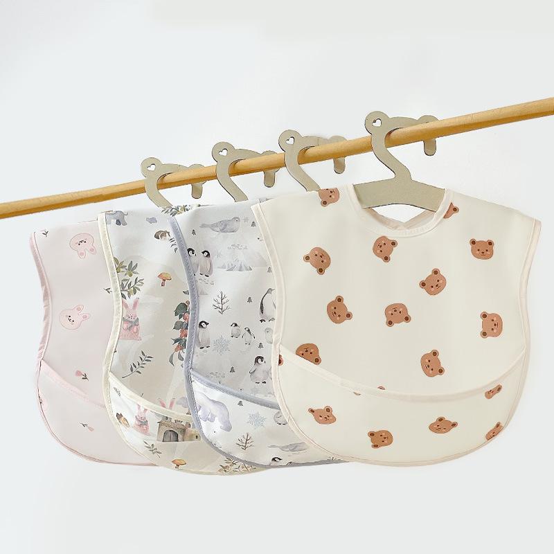 Waterproof Cotton Baby Apron: Stain-Resistant PU Reversible Bib with Pocket for Toddlers and Infants.