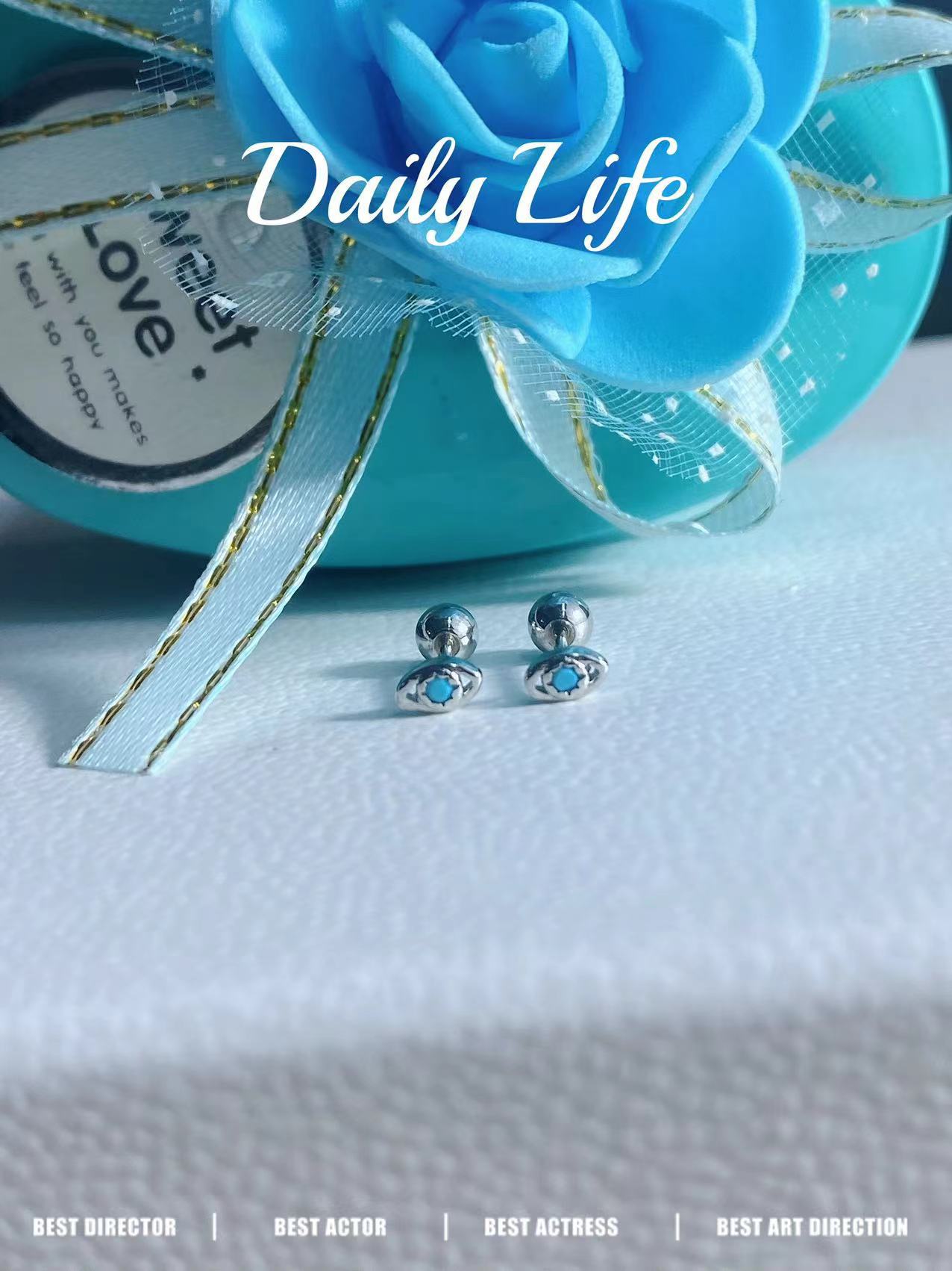 Sweet and cool style blue eyes stud earrings female cold feeling niche light luxury earbone stud exquisite earrings