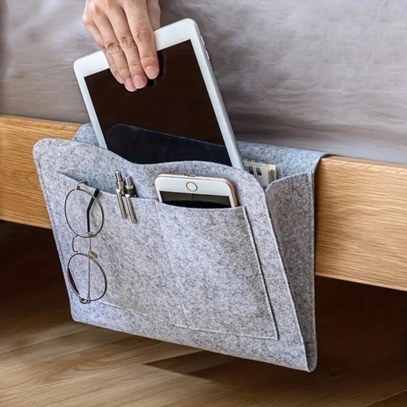 

Bedside hanging storage bag Mobile phone remote control tissue storage bag Bedside book storage hanging bag household items светло-серый