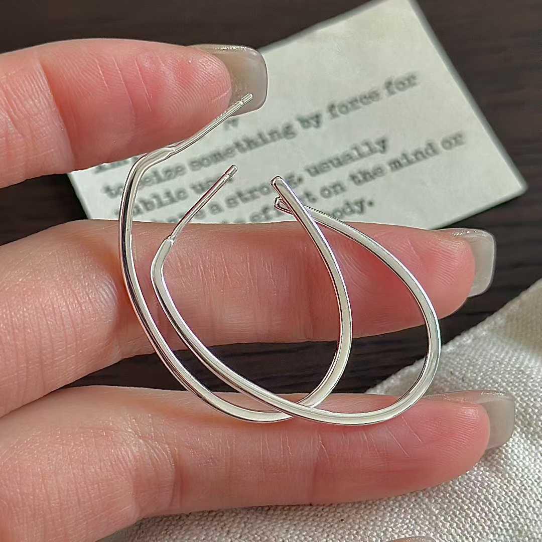 Sterling Silver Oval U-Shaped Earrings: Polished Half-Circle Hoops for a Simple, Elegant Look. 925 Sterling Silver