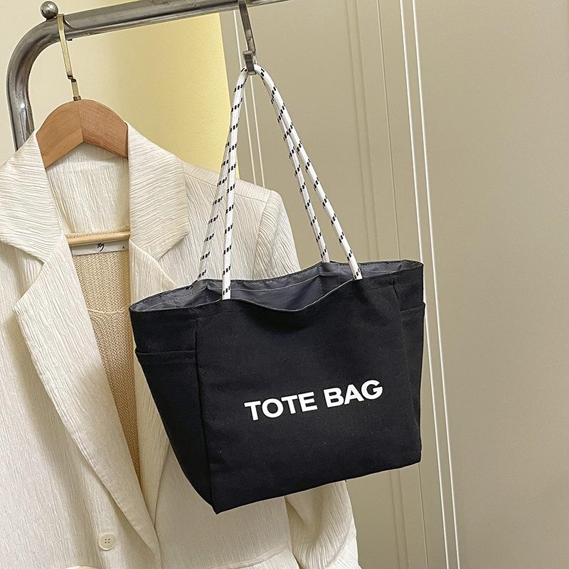 

Large capacity trendy fashion retro tote bag women s versatile casual personalized letter printing student shoulder bag чорний