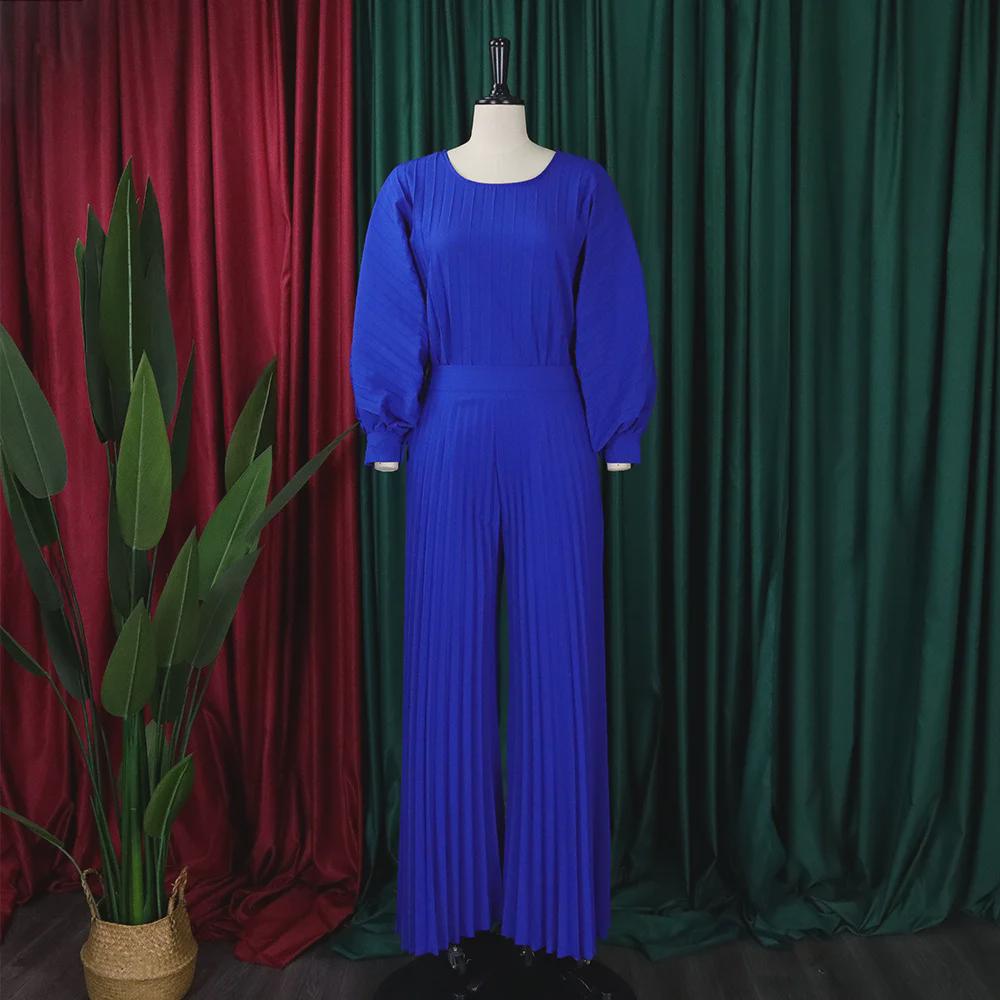 Europäischer und amerikanischer Sommer-Zweiteiler für Damen mit lockerer Passform: Freizeithemd und Hose mit weitem Bein.