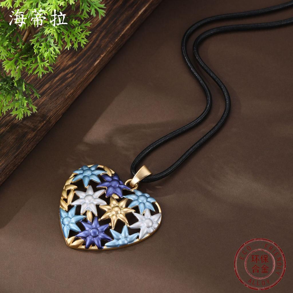 New enamel color hollow sunflower love long pendant women's high sense heart long necklace