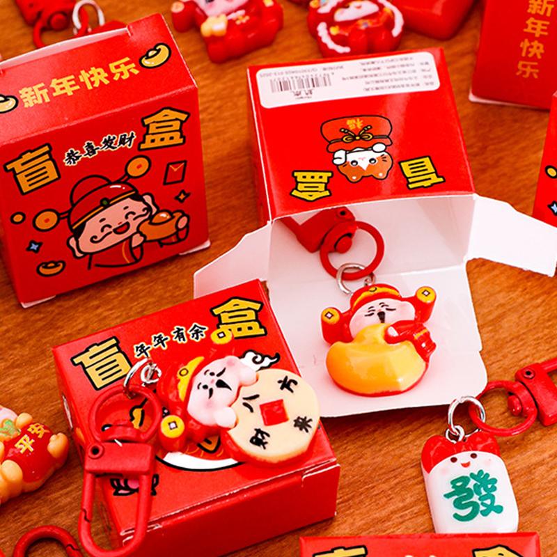 1/4 st Nyårs Blind Box Nyckelring Söt Mini Blind Box DIY Ryggsäck Dekor Hänge Miniatyr Nyckelring Överraskning Små Gåvor