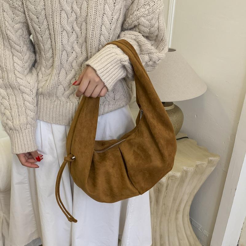 Commute Underarm Dumpling Bag - A Small, Unique and Sophisticated Shoulder Bag