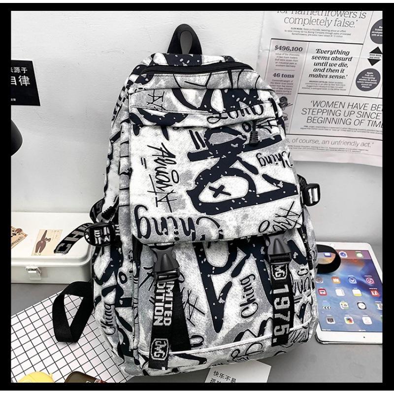 Mode Automne Cartable Personnalité Féminine Camouflage Graffiti Couple Sac à Dos Grande Capacité Sac à Dos Étudiant Masculin