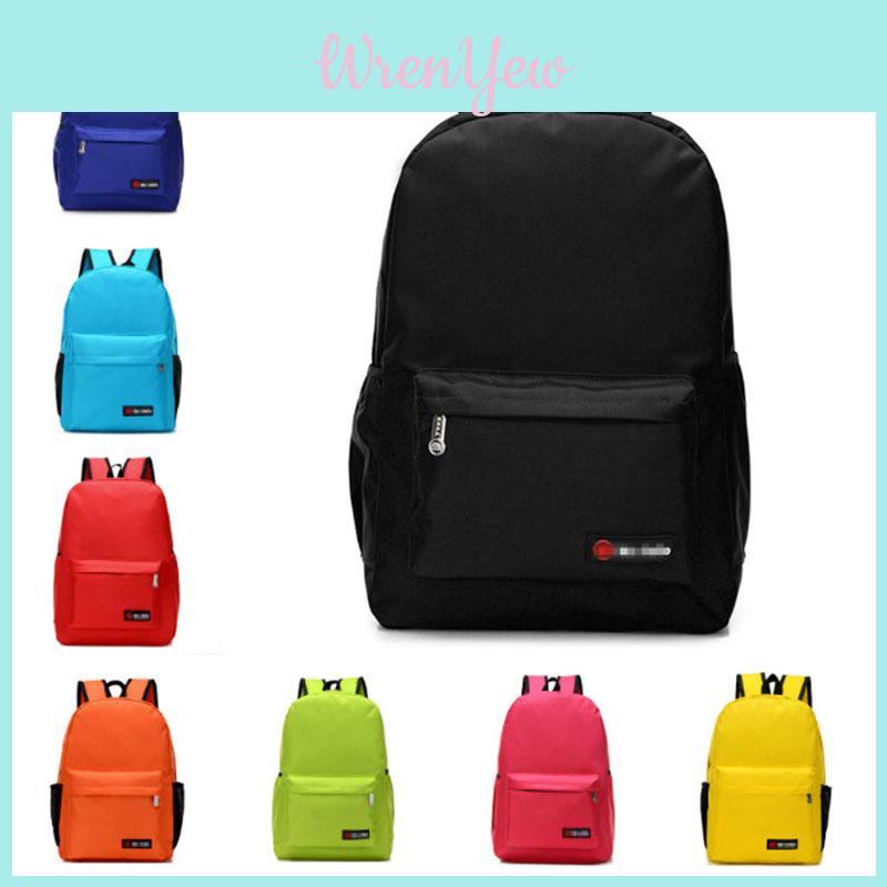 Spacious And Durable Student Backpack For Children With Stylish Plain Design And Anti-theft Functionality