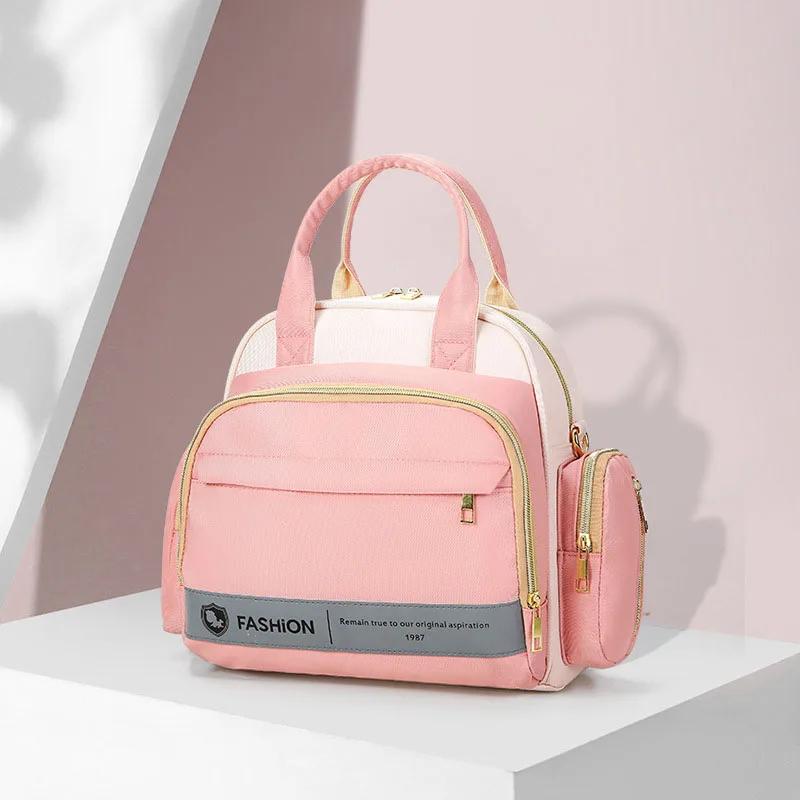 

Сумка для подгузников для мамы и папы, большая вместимость, портативная дорожная сумка для подгузников, сумка на плечо, сумка для мокрой бутылочки для молока, рюкзак для коляски розовый