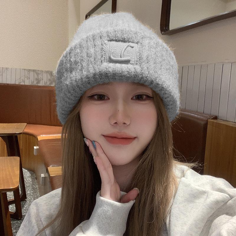 Plush Warm Knitted Beanie with Ear Flaps, Slouchy Design, Face-Slimming Knit Hat for Women with Larger Head Circumference.