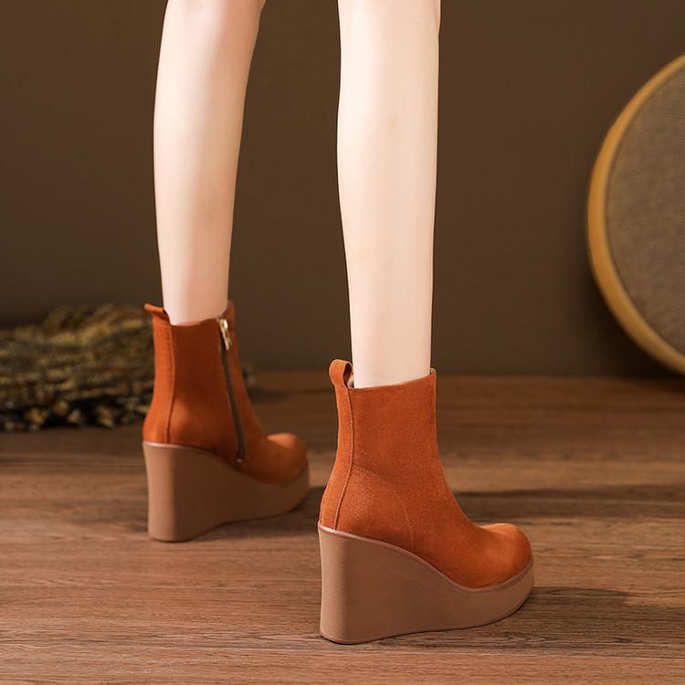 10Cm leather wedge heel short boots 2025 autumn and winter new small thick bottom side zipper super high heel pointed thin boots