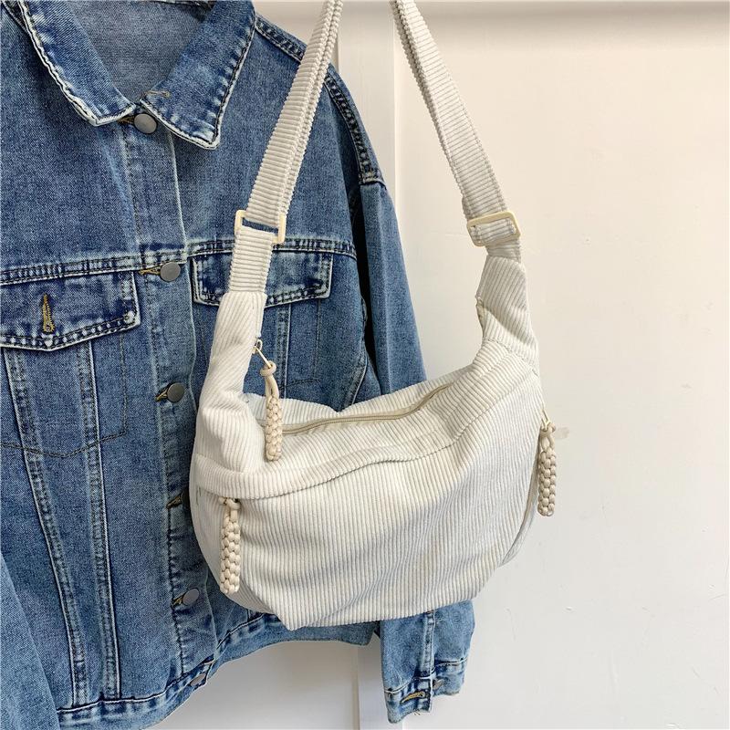 Spring new simple large-capacity messenger bag female student small satchel sports versatile backpack dumpling bag