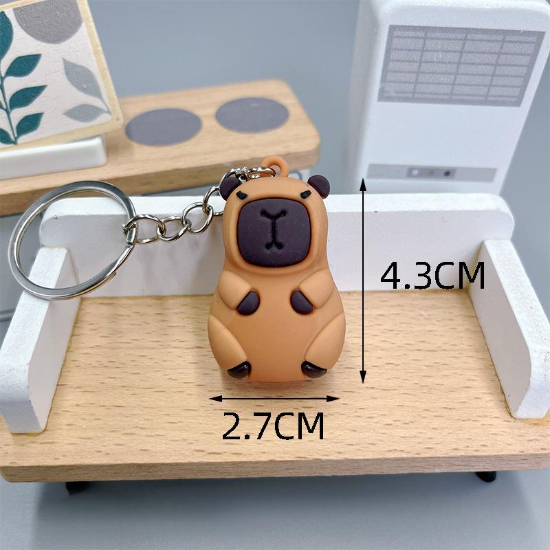 

Брелок с подвеской в виде мультяшной капибары, чехол для наушников, подвески, сумка, декор, автомобильный брелок, подарок