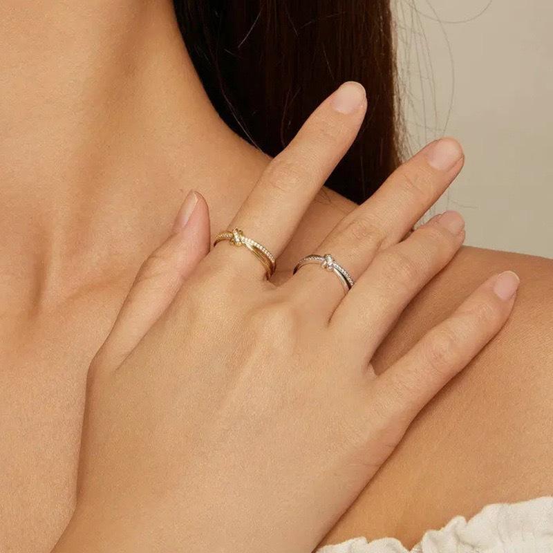 Elegant European & American Style S925 Sterling Silver Knot Ring with Micro-paved Zircon - Simple, High-end Fashion for Women.