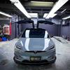 Tesla Model X RZ Carbon Fiber Body Kit: Front Lip, Modified Bumper, Rear Lip, Side Skirts.