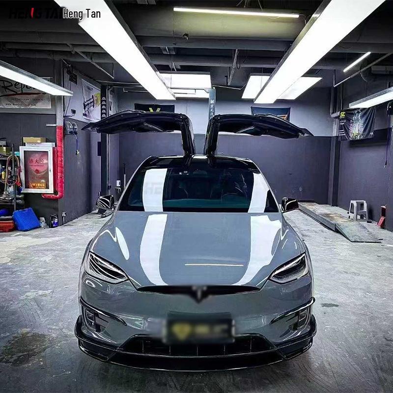 Tesla Model X RZ Carbon Fiber Body Kit: Front Lip, Modified Bumper, Rear Lip, Side Skirts.