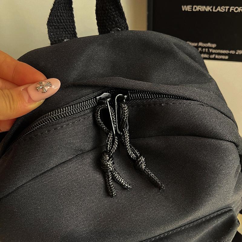 Minimalist Backpack for Women and Men Lightweight Nylon School Bag with Front Pocket
