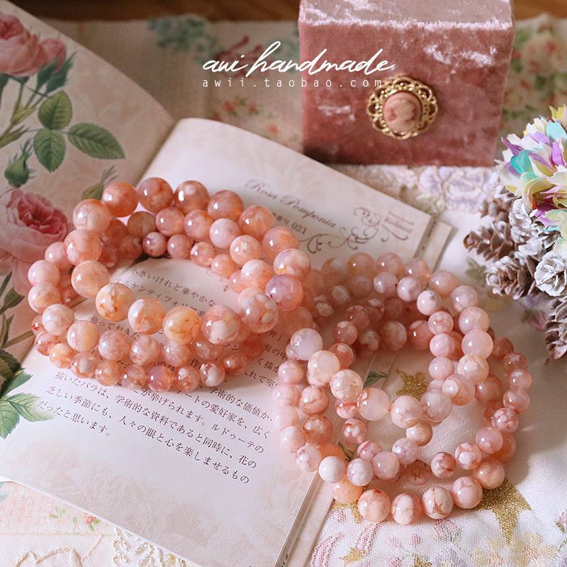 

Sakura Collector’s Grade Handmade Translucent Pink Agate Bracelet for Women
