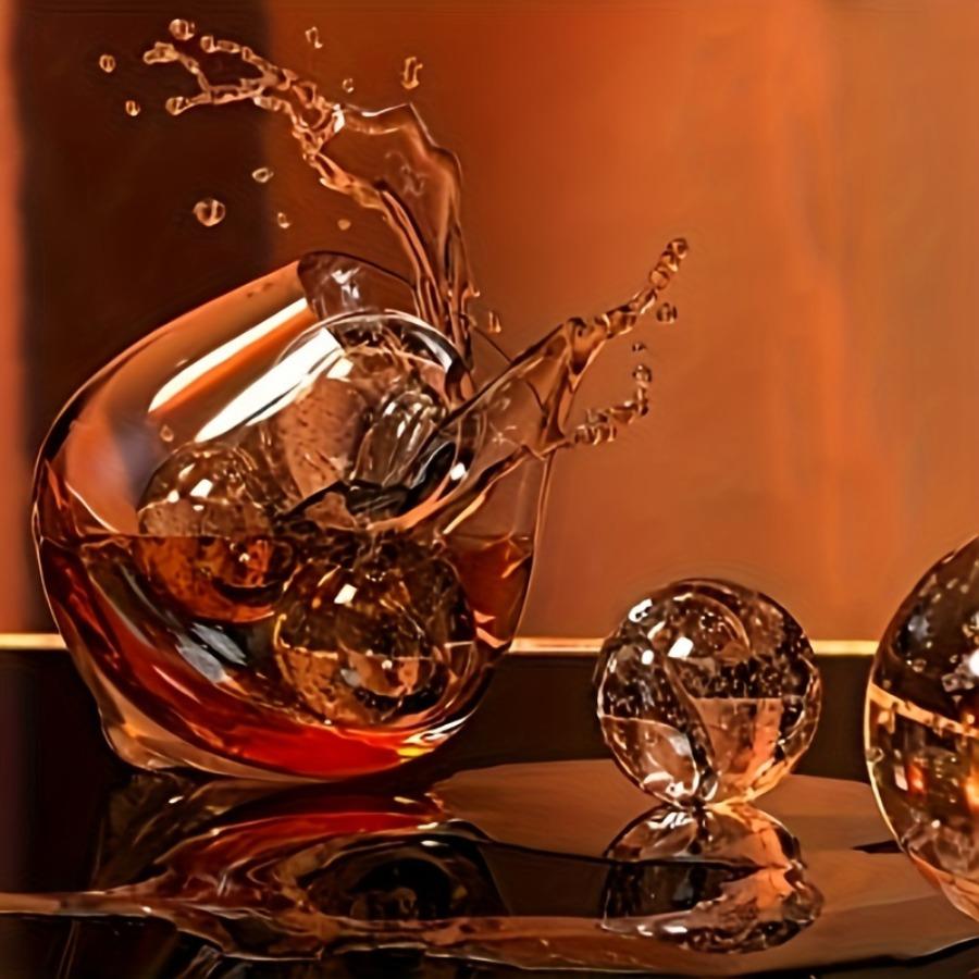 A Compact Spherical Cube of Ice Mold Featuring a 4-Grid Design for Whiskey, Ideal for Cocktails And Parties.