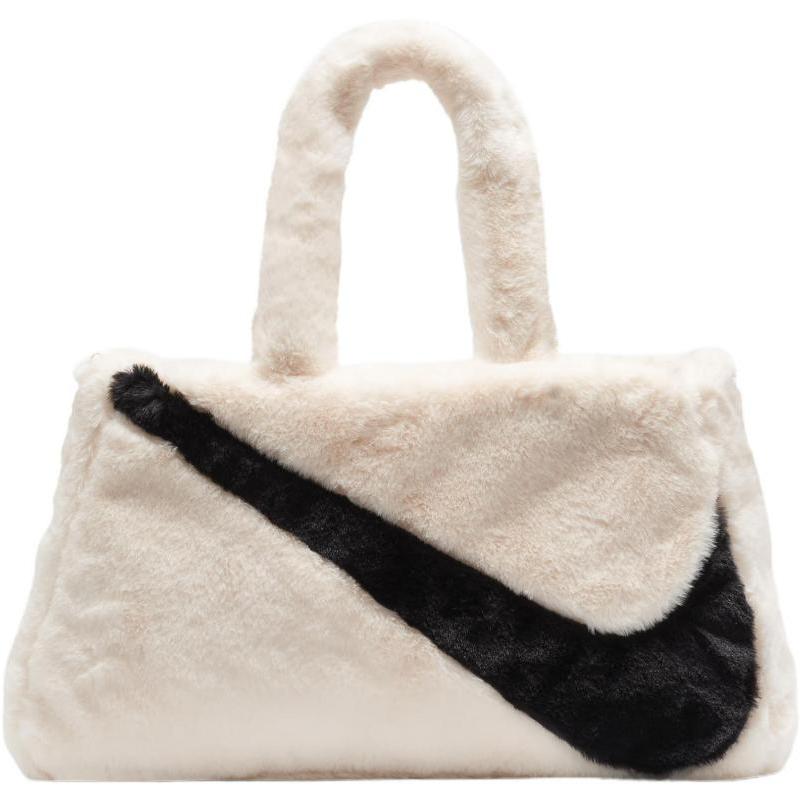 

Nike Sportswear Faux Fur 10L Tote Bag Guava Ice Casual FB3050-838
