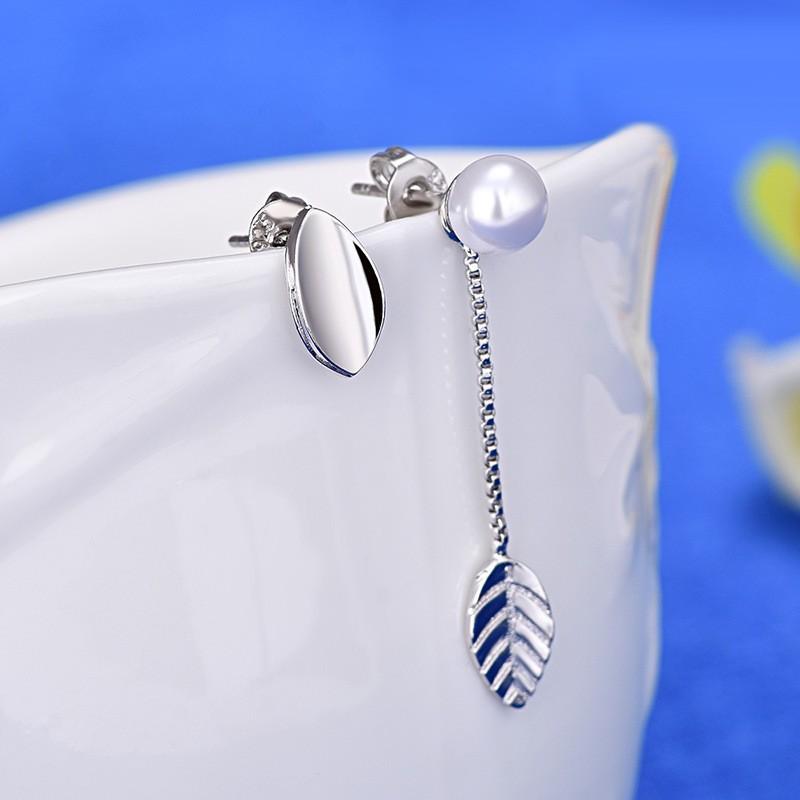 

Жемчужные серьги «Новый лист» Асимметричные серьги Серьги-иглы Высококлассные серьги Аксессуары в отпускном стиле