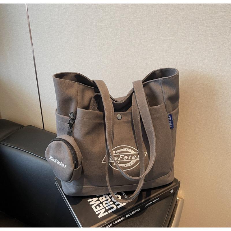 

Large-capacity tote bag women s new simple commuter canvas bag shoulder bag college student class bag
