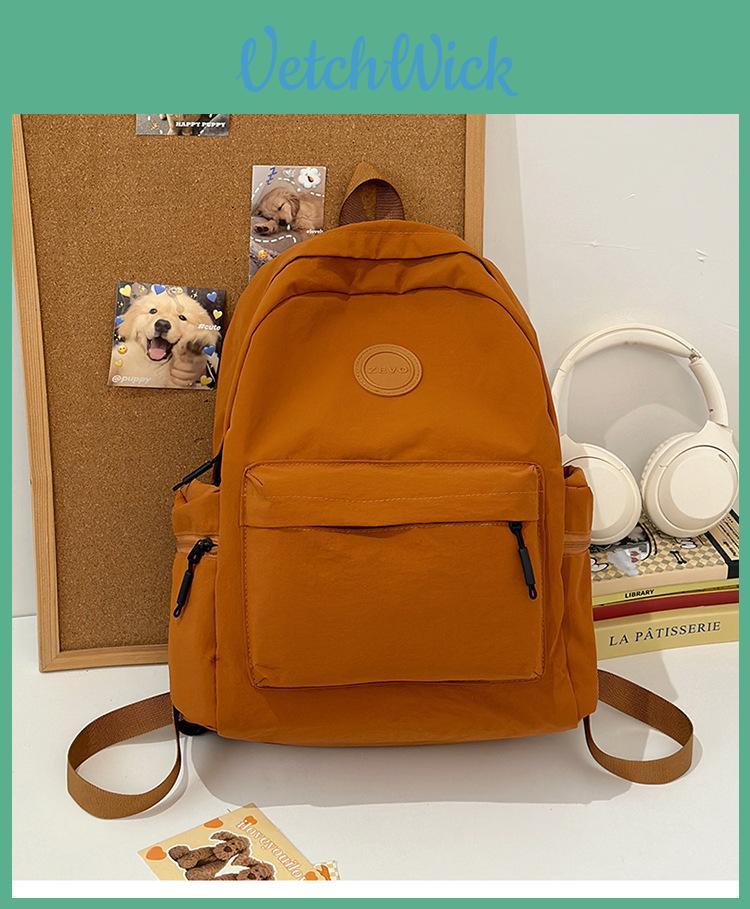 College Style Nylon Book Bag With Alphabet Decoration And Solid Color Design For Students