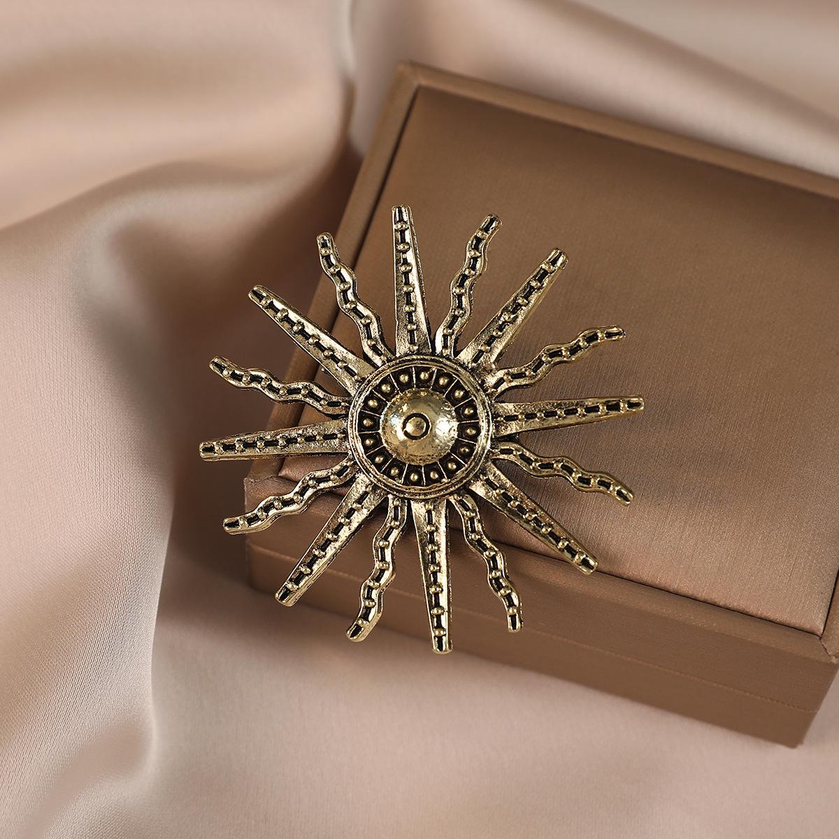 

Metal Sunburst Brooch Pin with Detailed Textured Design Vintage Style Accessory for Clothing Bags and Hats Unique Statement Jewelry Gift