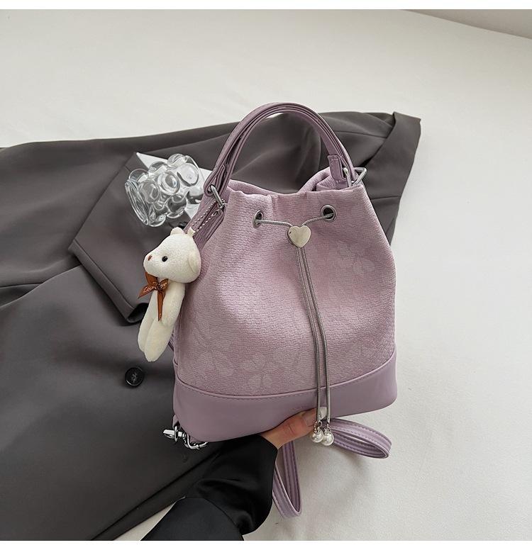 

2025 simple retro bucket backpack new shoulder bag temperament bucket bag design sense commuter student backpack