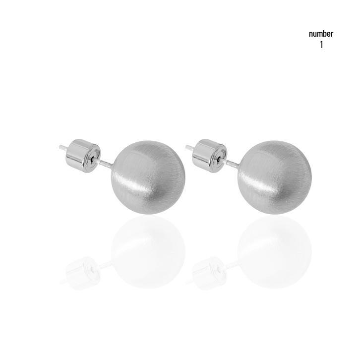 

Элегантные круглые серьги-пусеты из матового серебристого металла