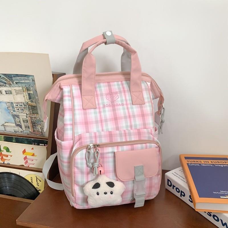 

Spacious Waterproof Plaid Backpack Gender-neutral Design Perfect For Commuting рожевий