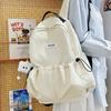 Korean version of casual literary canvas schoolbag ins pleated nylon drawstring ultra-light simple versatile casual backpack