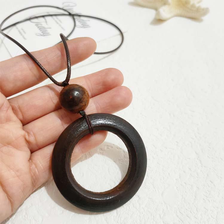 Retro Leather Rope Necklace with Wooden Alloy Pendant for Cotton and Linen Sweaters