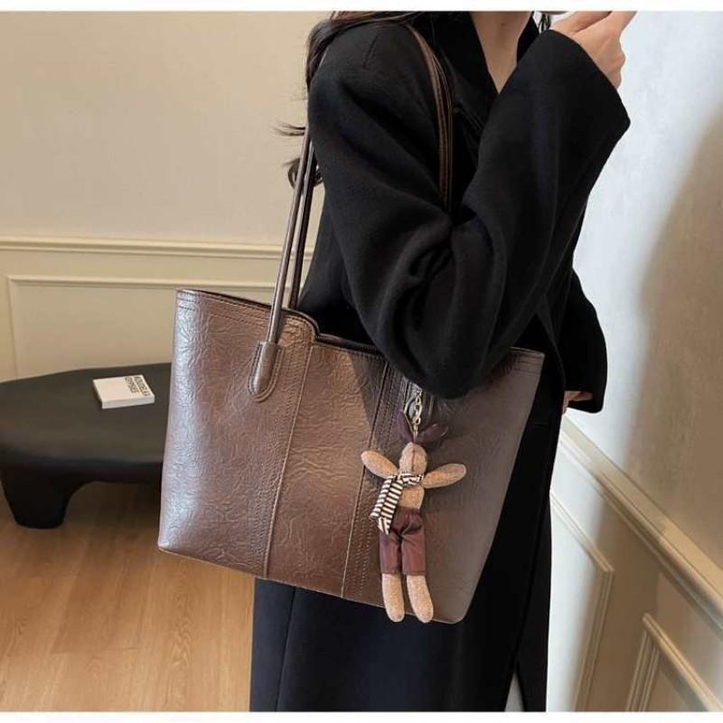 Hochwertige Retro-Tasche mit großem Fassungsvermögen, modische Damen-Umhängetasche für Pendler, beliebte Tragetasche