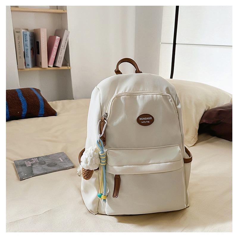 Fresh and sweet candy color backpack for junior high school students, solid color, simple and large-capacity backpack.