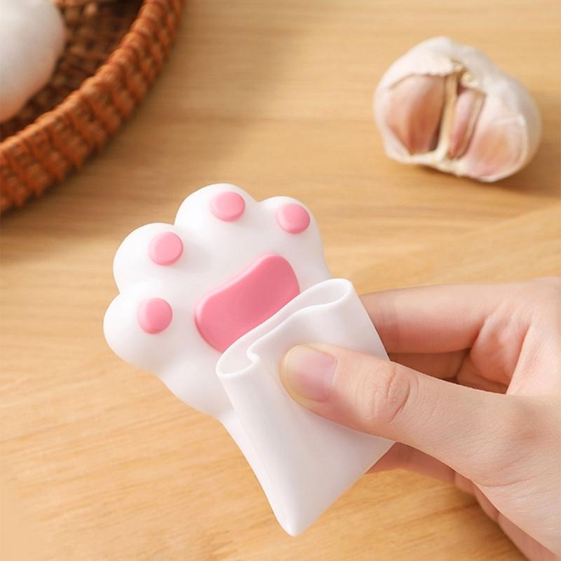 Outil Rapide Éplucheur d'Ail Avec Forme Griffe de Chat Rouleau à Éplucher Polyvalent Pour Noix Cacahuète Gadget de Cuisine