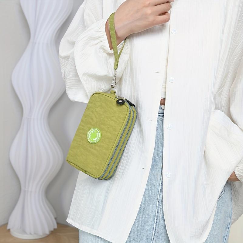 Chic Black Phone Bag with Detachable Strap, Triple Zipper Closure, Spacious Women Handbag