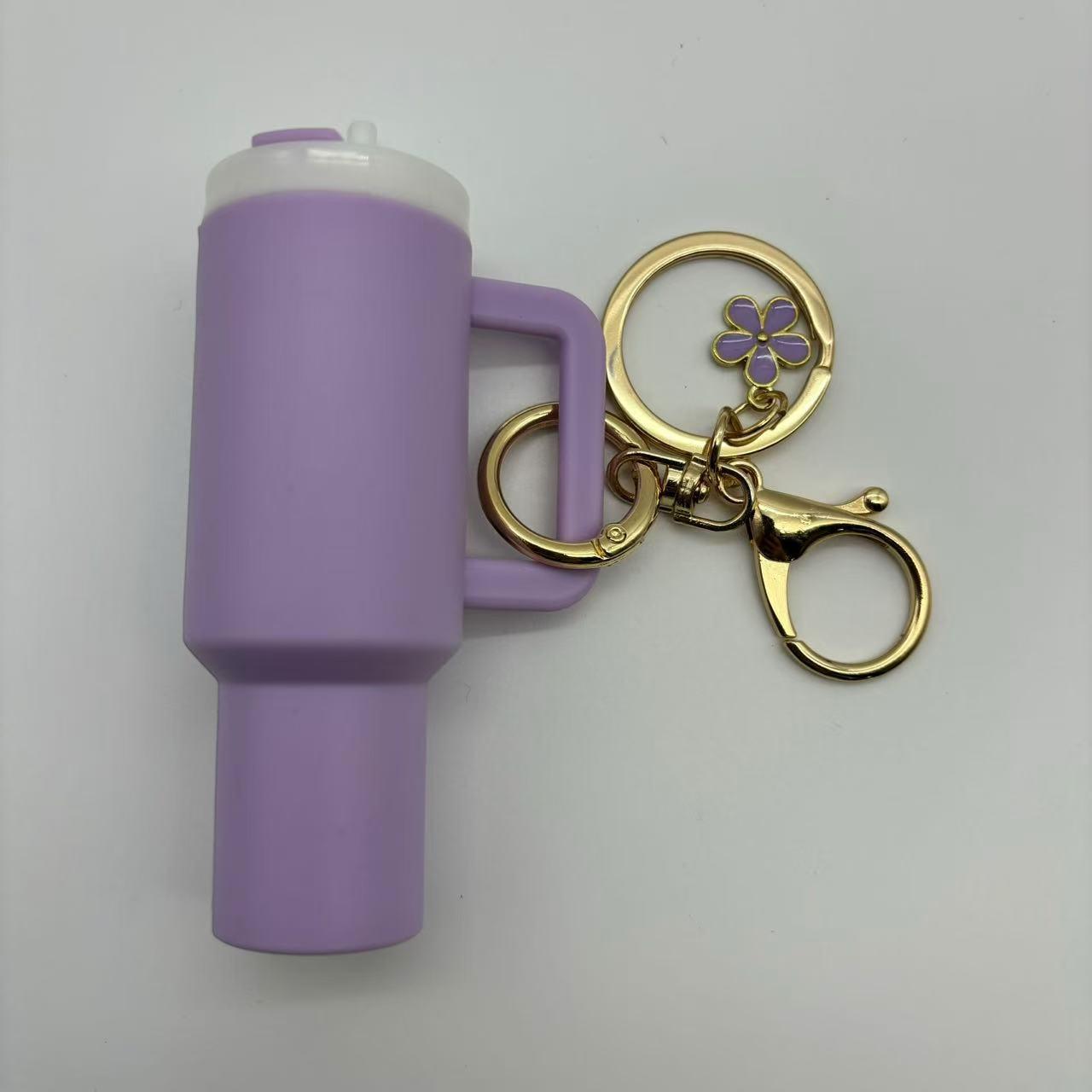Borderless Ice Buster Keychain with Lipstick Holder & Flower Pendant светло-фиолетовый
