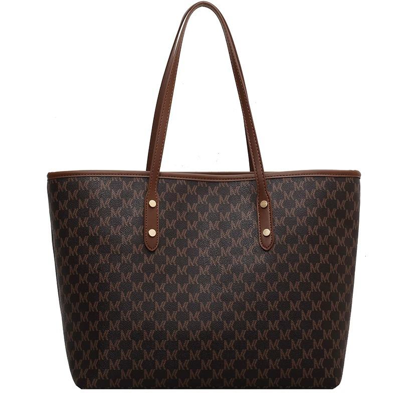 Die Tasche ist eine High-End-, exquisite, Nischen-, großvolumige Tasche, vielseitige große Pendlertasche, mit Textur für Damen, tragbare Tote Bag.