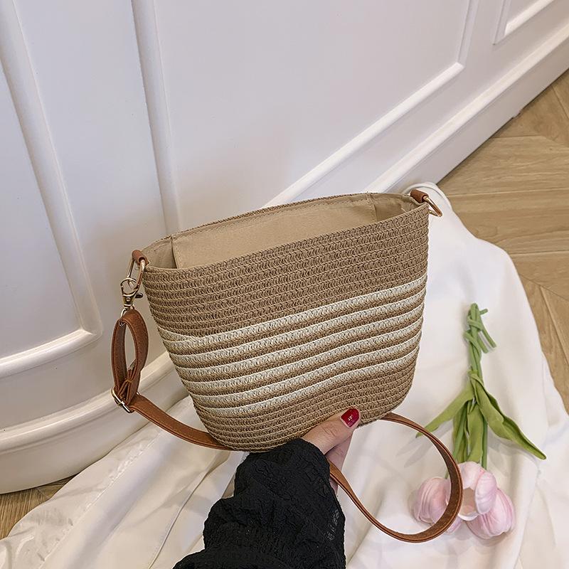 

Летняя популярная соломенная плетеная сумка для женщин, новый стиль пляжного отпуска, плетеная сумка, повседневная универсальная сумка-ведро через плечо