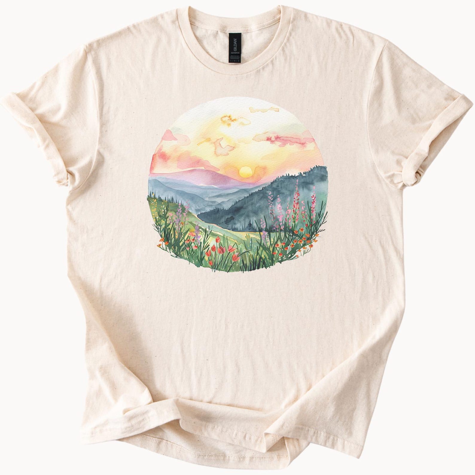 Mountain wildflower sunrise scene watercolor mountainscape nature graphic t shirt pastel sky flowers tee 140