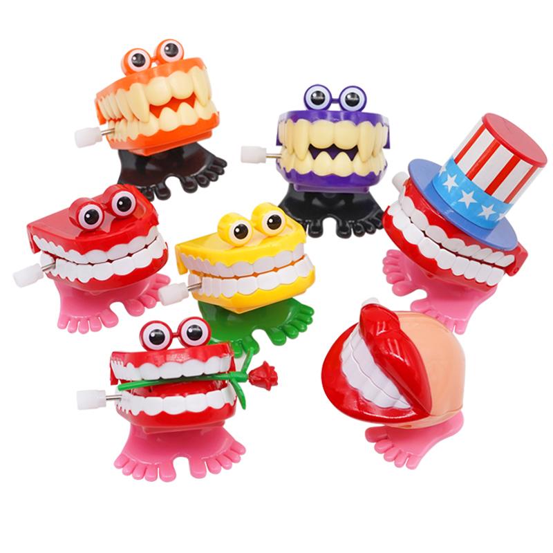 5Pcs Children Gifts Tooth Shape Mini Clockwork Jumping Toy Funny Cute Jump Teeth Denture Educational Toys Spring Wind Up Toy