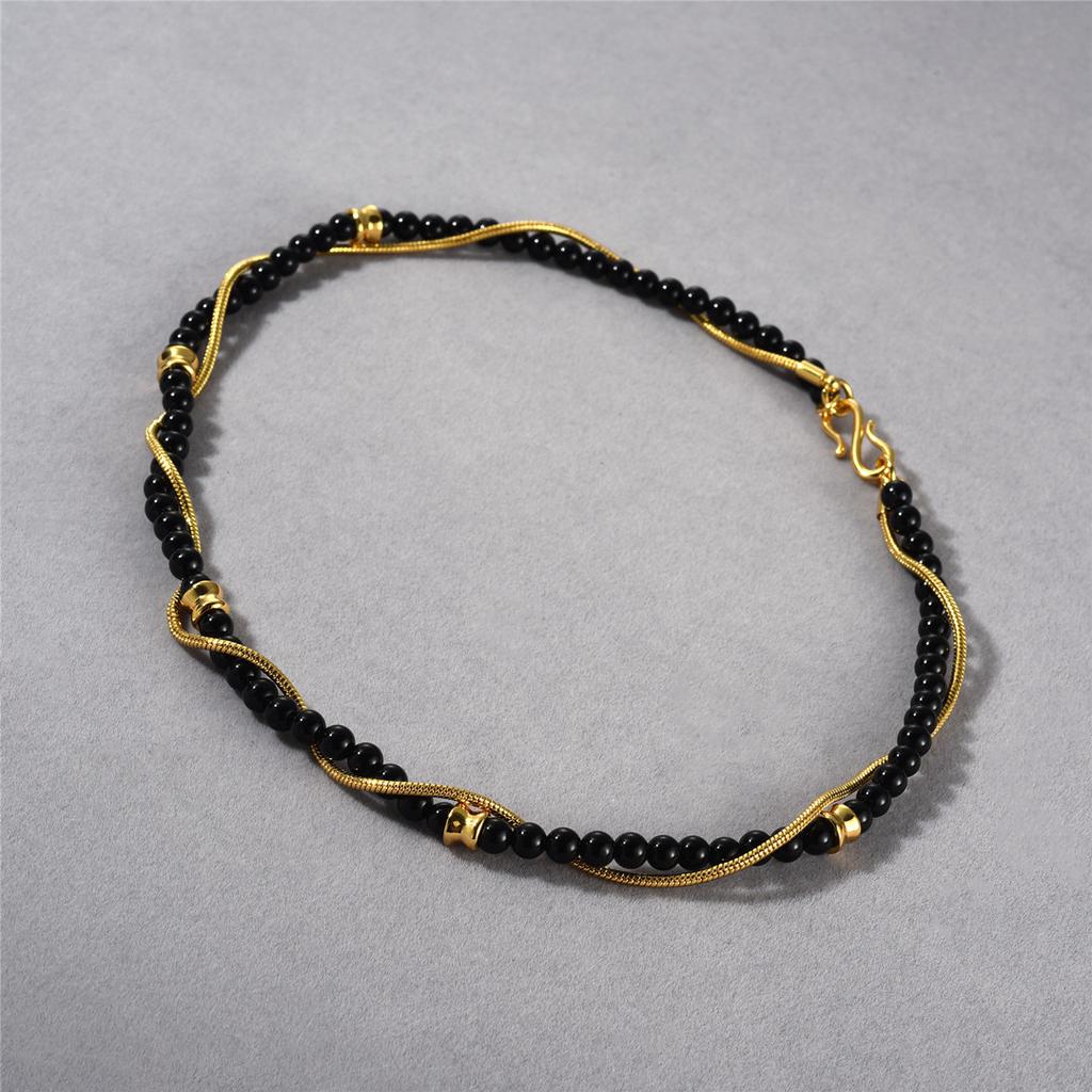 Premium Metal Copper Plated 18K Real Gold Fashionable High Street Color Matching Black Agate Wrapped Snake Bone Chain Personalized Unique Necklace